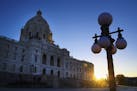 FILE - In this May 24, 2017, file photo, sun rises behind the Minnesota State Capitol in St. Paul, Minn. Minnesota lawmakers return to Capitol on Tues