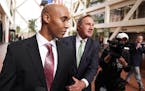 Mohamed Noor, accompanied by his legal team, Peter Wold, and Tom Plunkett left following a probable cause hearing for the ex-Minneapolis cop Thursday,