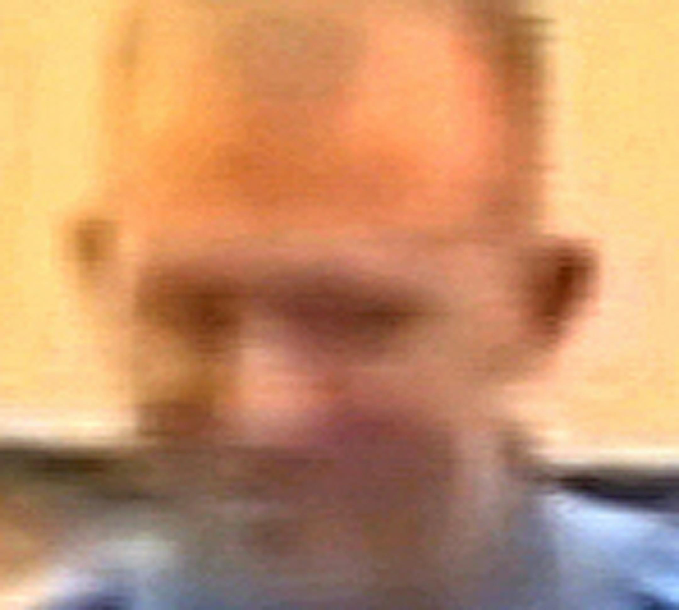 FILE - In this Feb. 11, 2014 file image from video provided by the City of Ferguson, Mo., officer Darren Wilson attends a city council meeting in Ferguson. Wilson is not expecting to face criminal charges from a Missouri grand jury that has been investigating the nationally watched case for the past several months, a police union official said Thursday, Nov. 20, 2014. Jeff Roorda, the business manager for the St. Louis Police Officers&#x2019; Association, said he met Thursday with Ferguson Polic