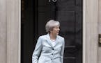 Britian's Prime Minister Theresa May prepares to welcome the First Minister of Wales, Carwyn Jones, to 10 Downing Street in London, ahead of talks, Mo