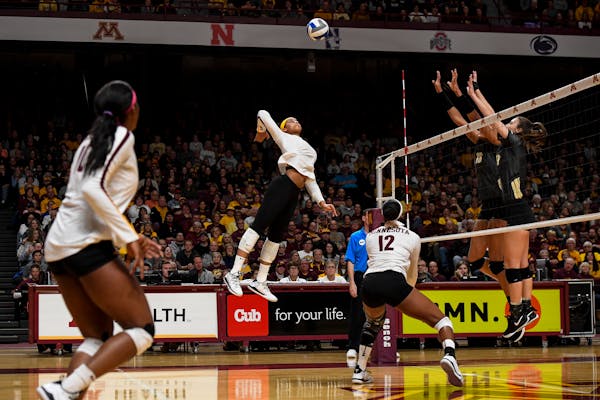 Gophers outside hitter Alexis Hart spiked the ball in the second set Saturday against Purdue.