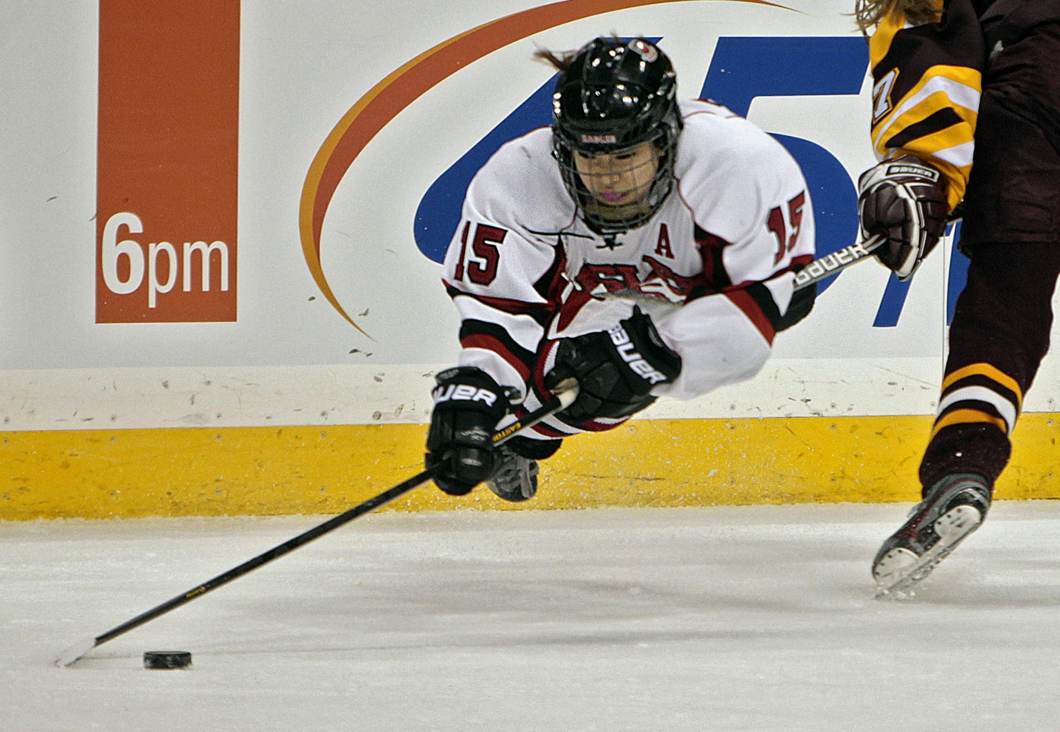 Eden Prairie's Amy Paulson was upended by Forest Lake's Kayla Brust in the first period. Brust was called for a tripping penalty on the play.