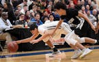 DeLaSalle guard Tyrell Terry (10) dove for a loose ball against Hopkins last season.