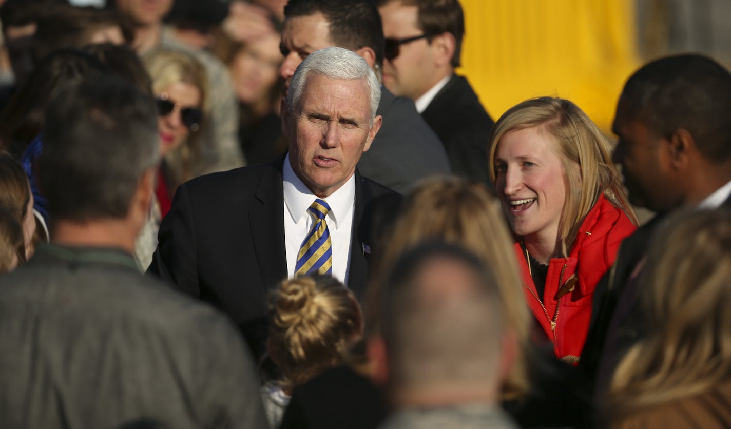 Supporters posed for photos with Vice President Mike Pence after his arrival at the Minnesota National Guard &#xf1; 934th Airlift Wing Tuesday afternoon. ] JEFF WHEELER &#xef; jeff.wheeler@startribune.com Vice President Mike Pence arrived in Minneapolis Tuesday evening, March 27, 2018 for a fundraiser tonight and an address he will give in the morning at an event called &#xec;Tax Cuts to Put America First,&#xee; at the Minneapolis Convention Center. He arrived at the Minnesota National Guard &#x