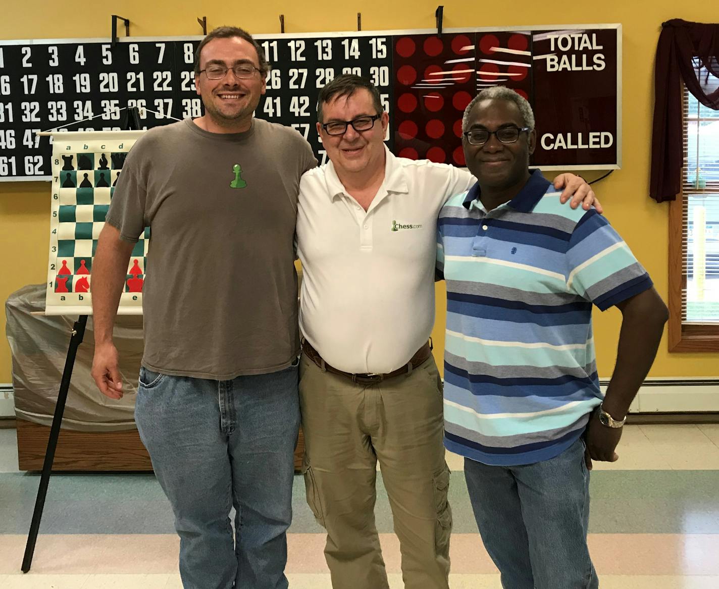 Dane Mattson, left, and Dr. Okechukwu Iwu, right, both chess masters from the Duluth-Superior area, and who were among the original organizers of the annual Twin Ports Open chess tournament, are joined by Grandmaster Alex Yermolinsky of South Dakota, who usually plays in the event.