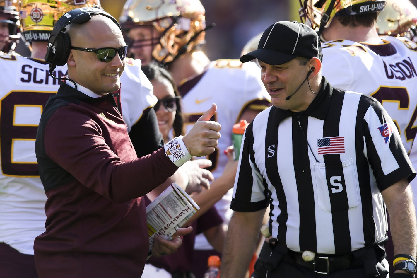 Gophers coach P.J. Fleck hired from the outside and promoted from within with two moves Friday.