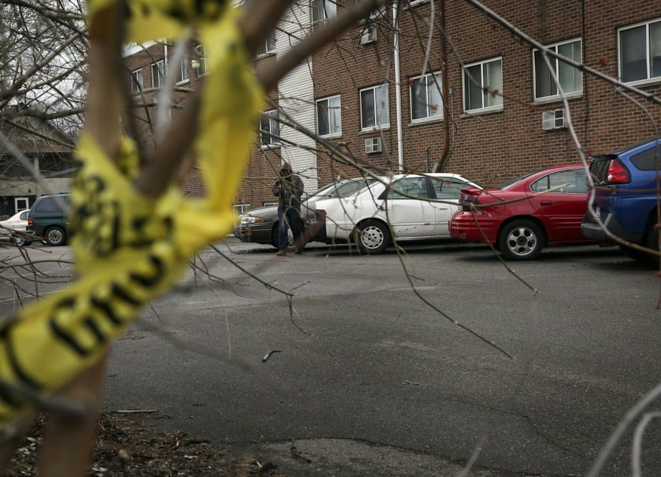 This apartment parking lot near Lake St. and 29th Avenue S. was the scene of a double homicide overnight, leaving a man and woman shot to death in their parked car and seen Saturday, April 12, 2014, in Minneapolis, MN.
