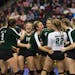 Maple Lake's volleyball team celebrates a comeback victory over Concordia Academy-Roseville in the Class 2A volleyball quarterfinals at Xcel Energy Ce
