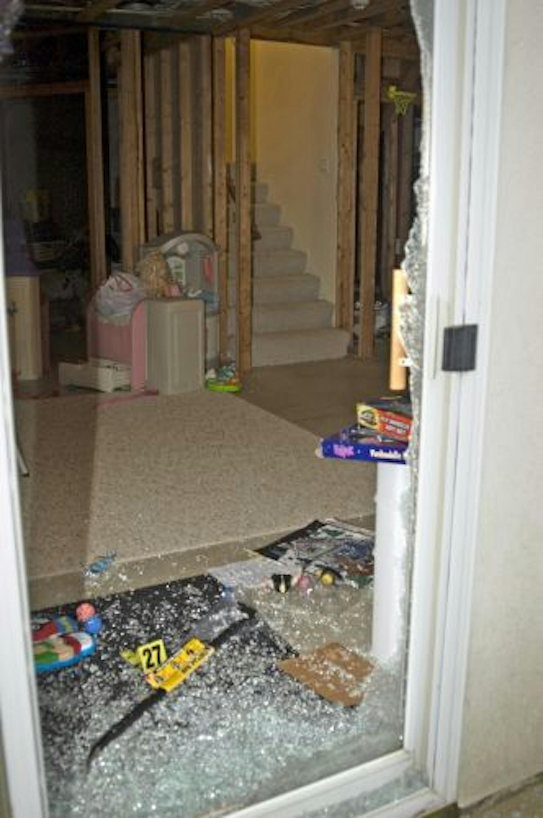 Broken patio door in the home of Teri Lee.