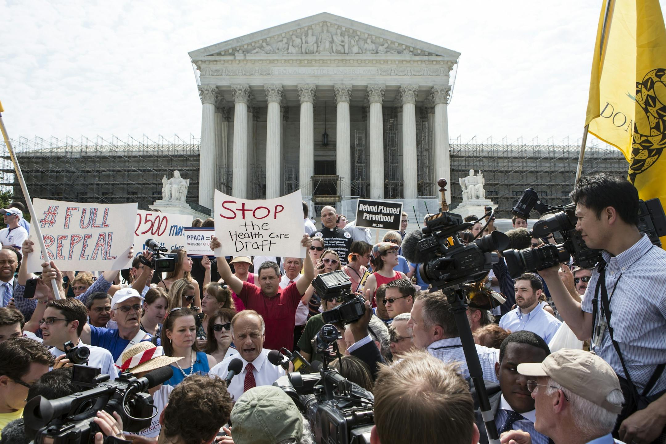 Rep. Steve King, R-Iowa, speaks outside the U.S. Supreme Court in Washington, on Thursday after the Supreme Court largely let stand President Barack Obama's health care overhaul.