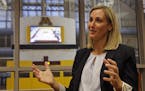 In this Monday, Aug. 10, 2015, photo, University of Minnesota interim athletic director Beth Goetz responds to a question during an interview in Minne