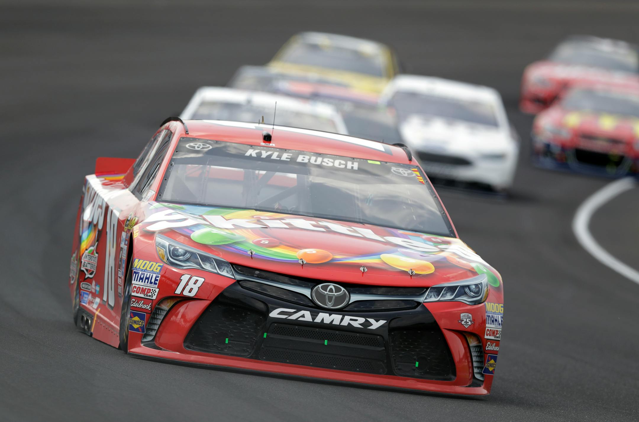 Winner Kyle Busch drove through the first turn during the Brickyard 400 at Indianapolis Motor Speedway on Sunday.