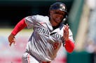 Twins catcher Christian Vázquez runs to third off a double hit by Kyle Farmer during the four-run fifth inning against the Angels on Sunday in Anahei