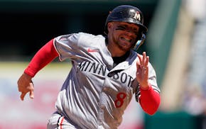 Twins catcher Christian Vázquez runs to third off a double hit by Kyle Farmer during the fifth inning against the Angels on Sunday in Anaheim, Calif.