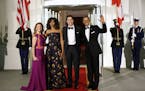 President Barack Obama and first lady Michelle Obama pose for a photo with Canadian Prime Minister Justin Trudeau and Sophie Gr�goire Trudeau at the