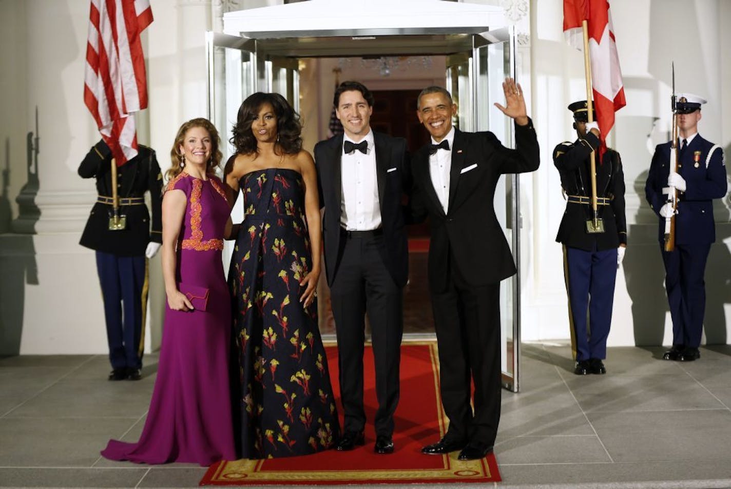 President Barack Obama and first lady Michelle Obama pose for a photo with Canadian Prime Minister Justin Trudeau and Sophie Gr�goire Trudeau at the North Portico of the White House in Washington, Thursday, March 10, 2016, as they arrive for a state dinner.