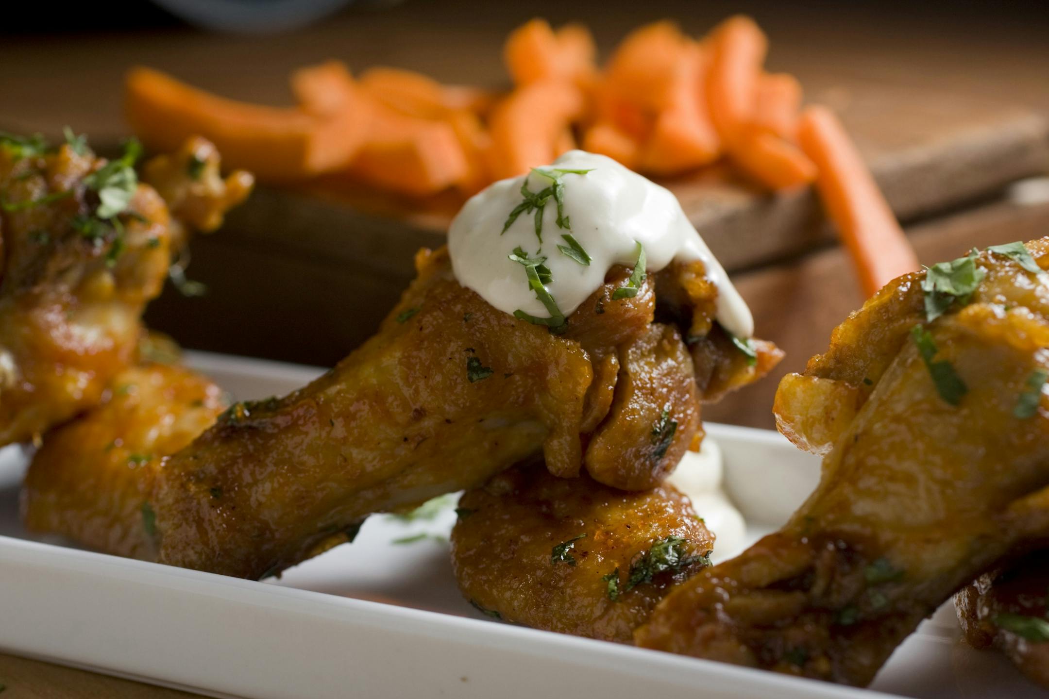 Perfect Buffalo wings start with high-quality chicken parts cooked using a two-phase frying technique.