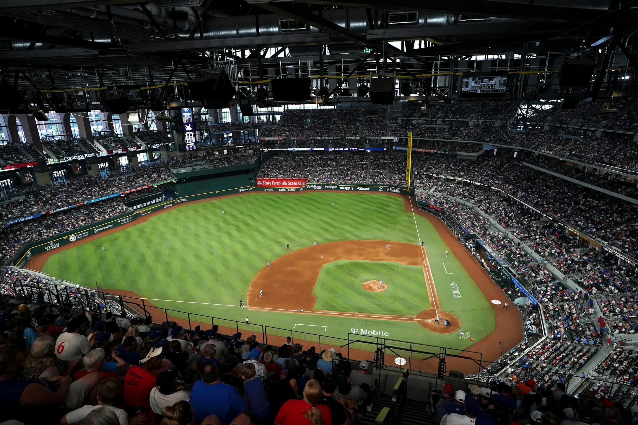 The Texas Rangers play against the Los Angeles Dodgers in this overall view of Globe Life Field during a baseball game Saturday, July 22, 2023, in Arlington, Texas. Los Angeles won 16-3. (AP Photo/Jeffrey McWhorter)