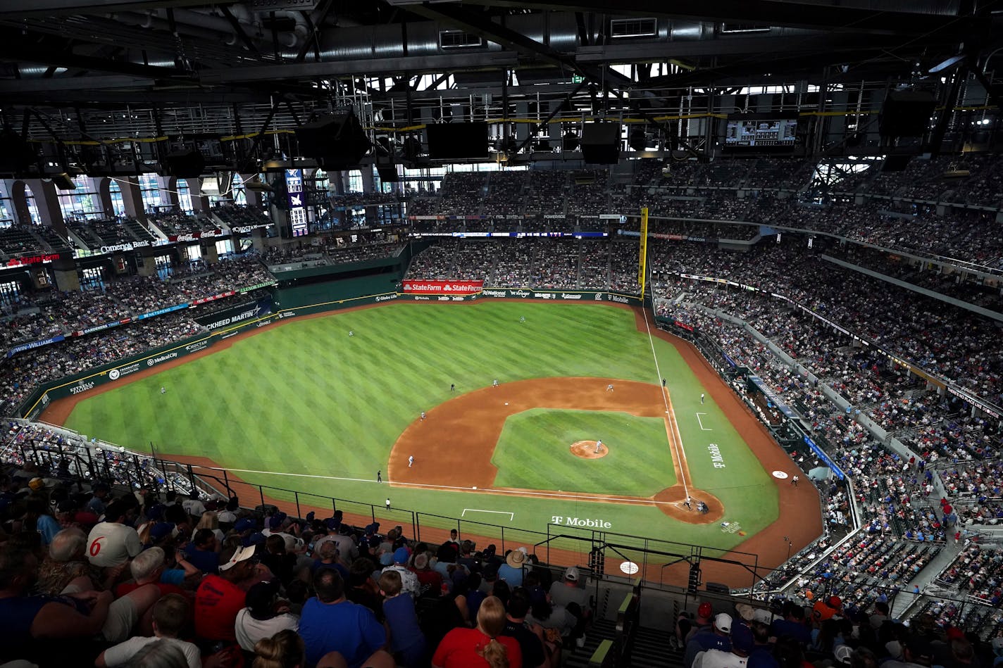 The Texas Rangers play against the Los Angeles Dodgers in this overall view of Globe Life Field during a baseball game Saturday, July 22, 2023, in Arlington, Texas. Los Angeles won 16-3. (AP Photo/Jeffrey McWhorter)