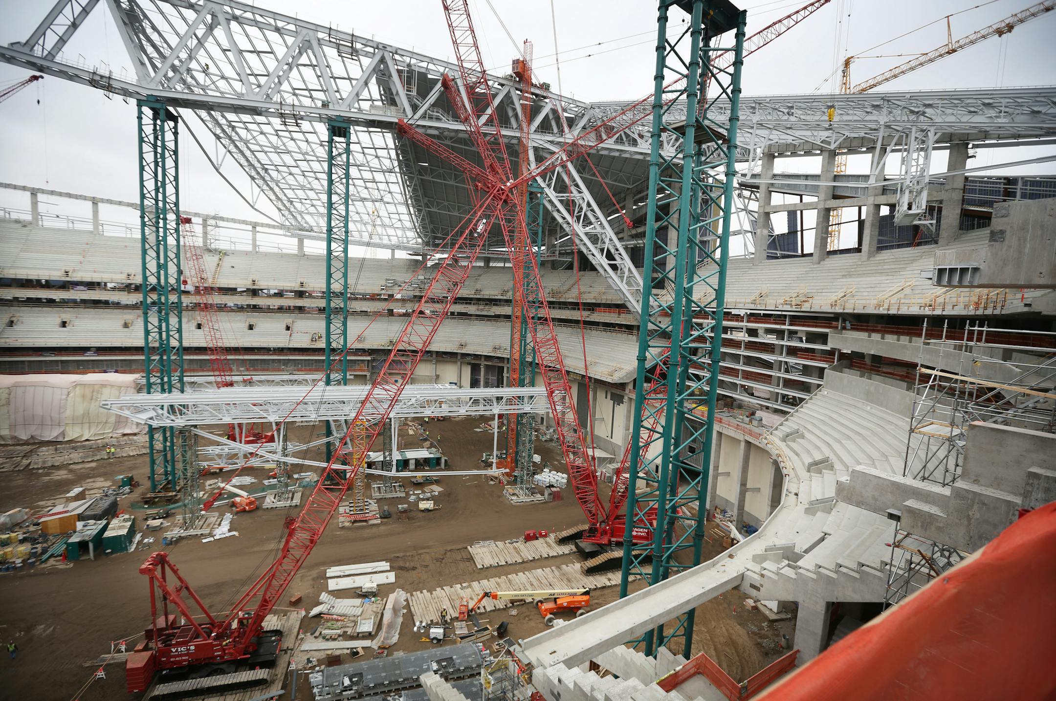 Construction of the Minnesota Vikings stadium has reached the halfway point, Wednesday, April 8, 2015 in Minneapolis. Officials from the team, general contractor Mortenson and the Minnesota Sports Facilities Authority, the public agency in charge of the venue, provided a media update and tour of the site on Wednesday. (AP Photo/Star Tribune, Jerry Holt) MANDATORY CREDIT; ST. PAUL PIONEER PRESS OUT; MAGS OUT; TWIN CITIES LOCAL TELEVISION OUT