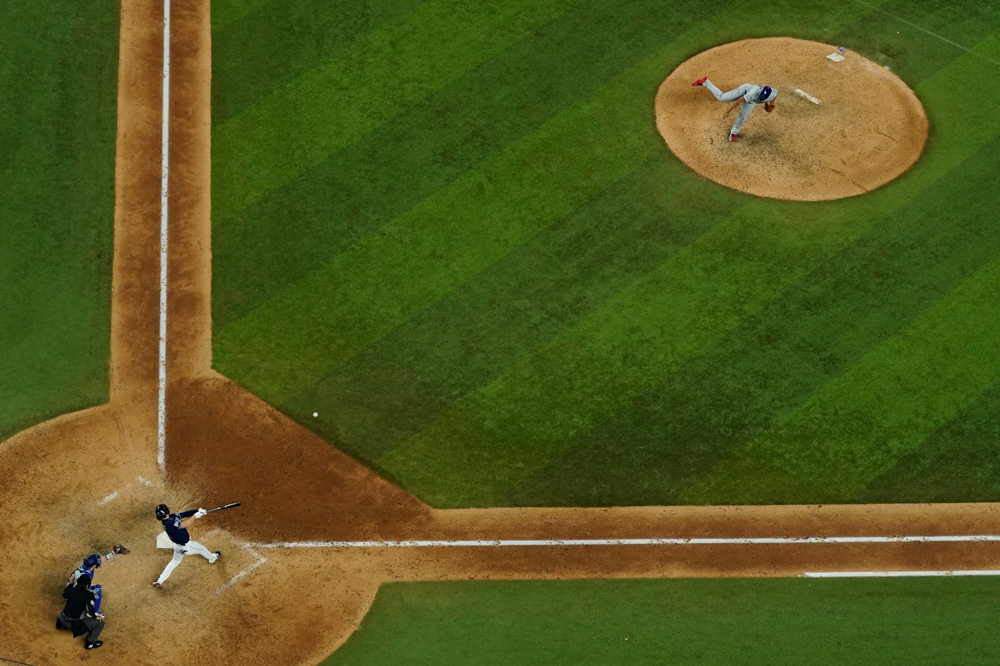 Tampa Bay Rays' Brett Phillips (14) gets the game winning hit against Los Angeles Dodgers relief pitcher Kenley Jansen in Game 4 of the baseball World Series Saturday, Oct. 24, 2020, in Arlington, Texas. Rays defeated the Dodgers 8-7 to tie the series 2-2 games. (AP Photo/David J. Phillip)