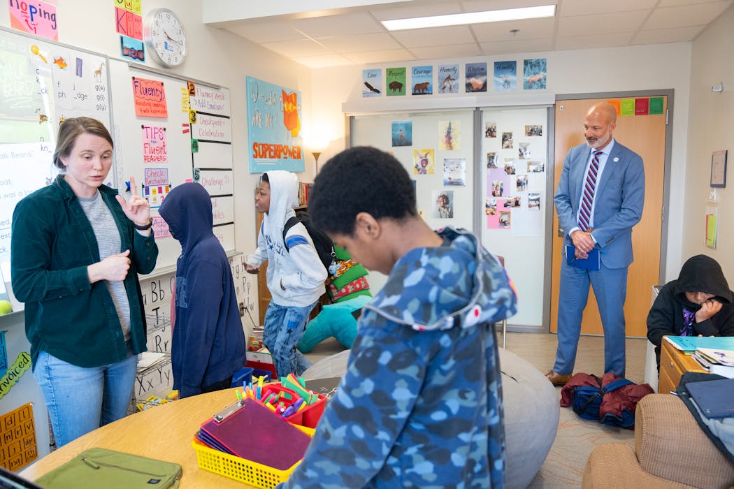 Joe Gothard, St. Paul schools superintendent, observes Rosie Malone-Povolny’s reading class at the American Indian Magnet School in St. Paul.