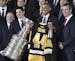 Sidney Crosby, of the Stanley-Cup-winning Pittsburgh Penguins hockey team, poses alongside U.S. President Barack Obama, NHL commissioner Gary Bettman 