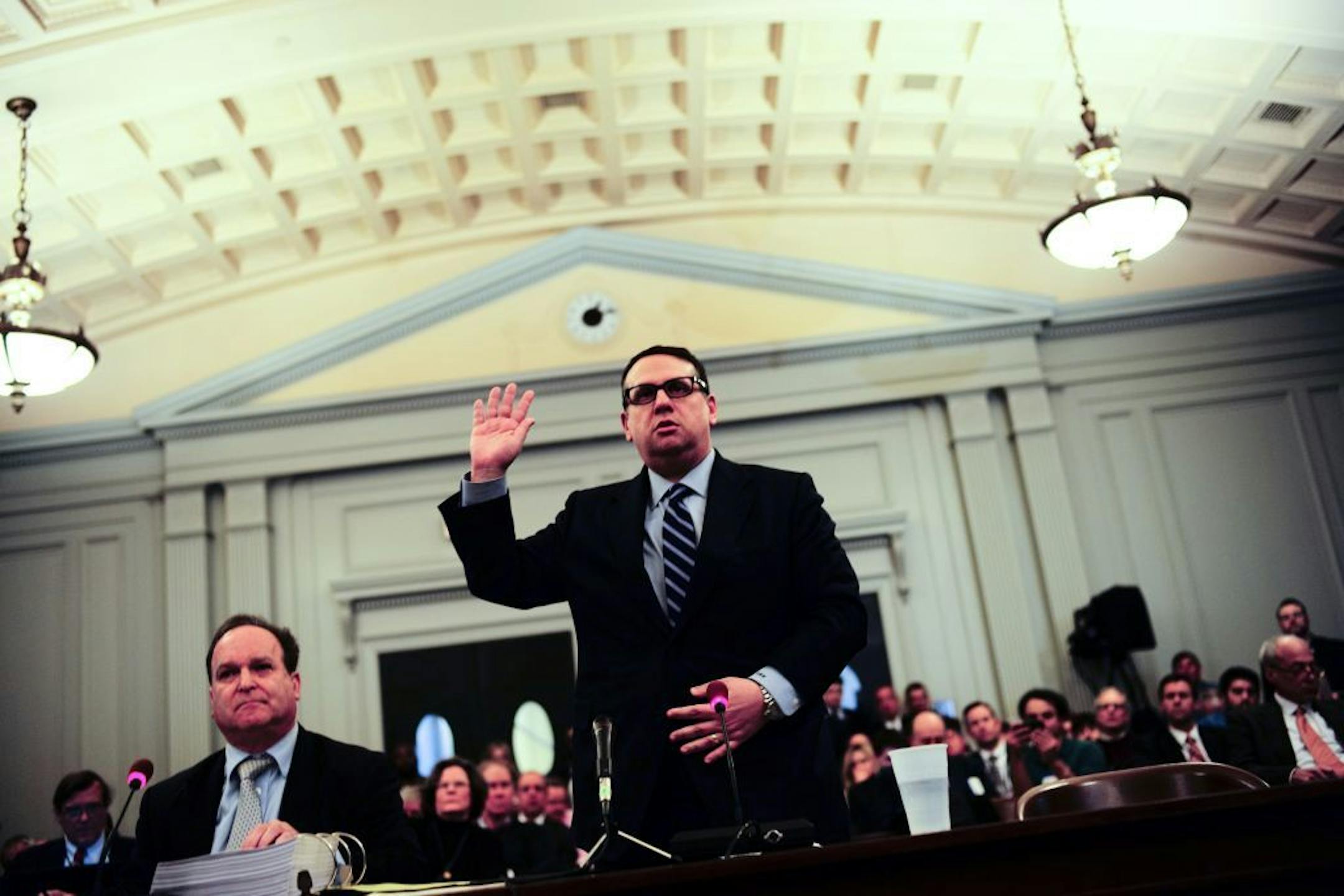 David Wildstein, right, who resigned from the Port Authority of New York and New Jersey amid a scandal over lane closings on the George Washington Bridge, with his lawyer Alan Zegas during a New Jersey Assembly hearing in Trenton, Jan. 9, 2014.