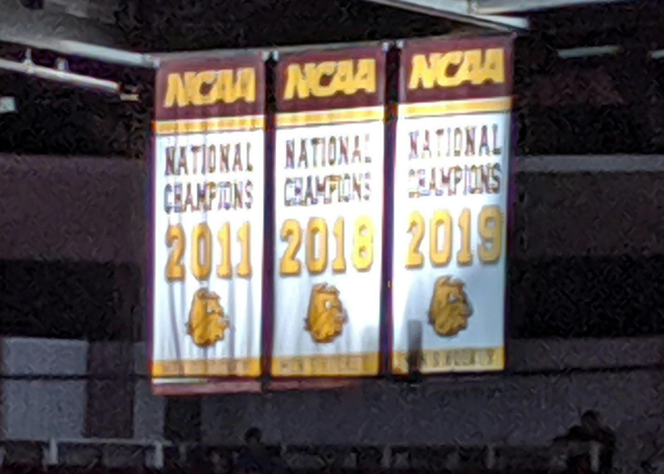 Last season's NCAA title banner was raised to the rafters Friday night.
