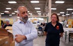 Martin Pochtaruk, top, president and founder of Heliene Inc., gave a tour of his solar panel manufacturing facility in Mountain Iron, Minn., in May.