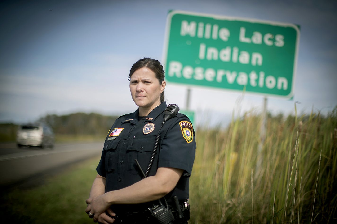 Mille Lacs Band of Ojibwe Interim Police Chief Sara Rice stood near the sign where she and her department have jurisdiction on the reservation, Thursday, September 28, 2017. ] ELIZABETH FLORES &#xef; liz.flores@startribune.com