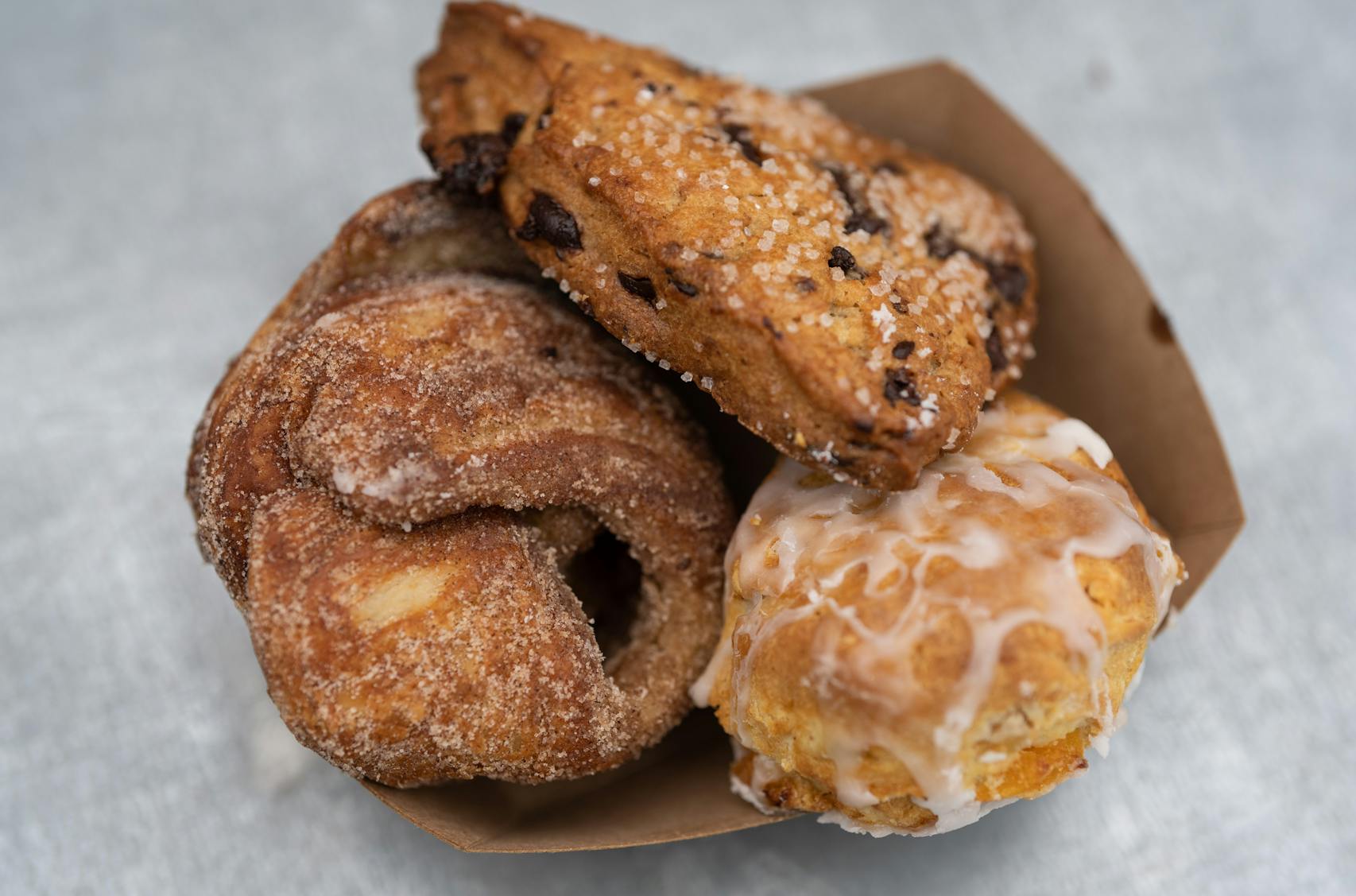 Cinnamon Twist, Chocolate Banana Scone and Apricot Ginger Scone from French Meadow. New foods at the Minnesota State Fair photographed on Thursday, Aug. 25, 2022 in Falcon Heights, Minn. ] RENEE JONES SCHNEIDER • renee.jones@startribune.com