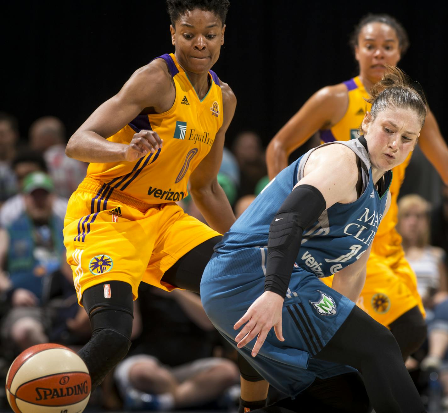 Los Angeles Sparks guard Alana Beard (0) knocked the ball loose while defending Minnesota Lynx guard Lindsay Whalen (13) in the second quarter Friday at Target Center.