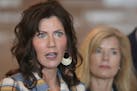 South Dakota Gov. Kristi Noem, left, updated media on the COVID-19 pandemic during a news conference March 18.
