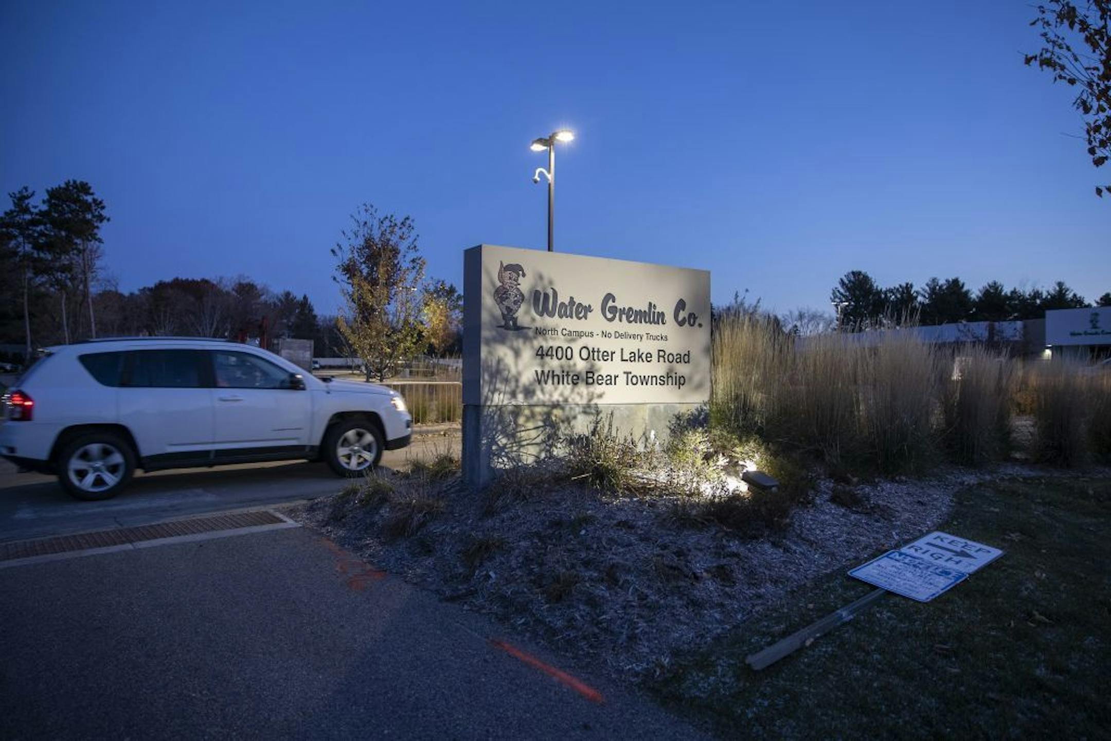 Water Gremlin employees made their way into the lot as its doors reopened for production after being shut down for more than a week over lead concerns, Tuesday, November 5, 2019 in White Bear Township, MN.