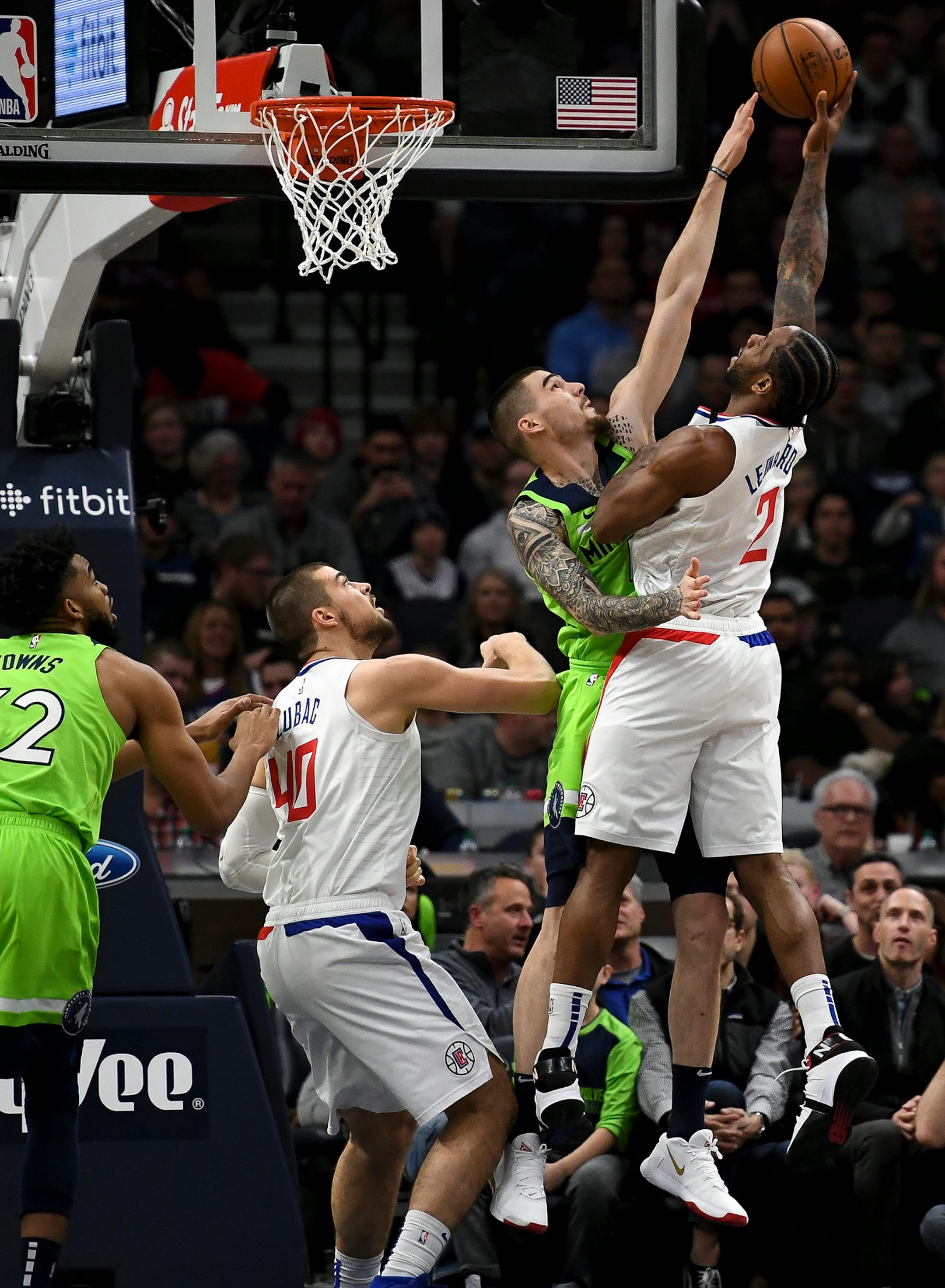 Minnesota Timberwolves forward Juan Hernangomez (41) got a piece of the ball as he fouled LA Clippers forward Kawhi Leonard (2) in the first half.