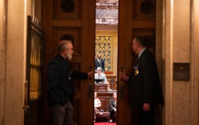 Senate President Bobby Joe Champion (DFL-Minneapolis) presides over the Senate for a short session before recess during the last day of the legislativ