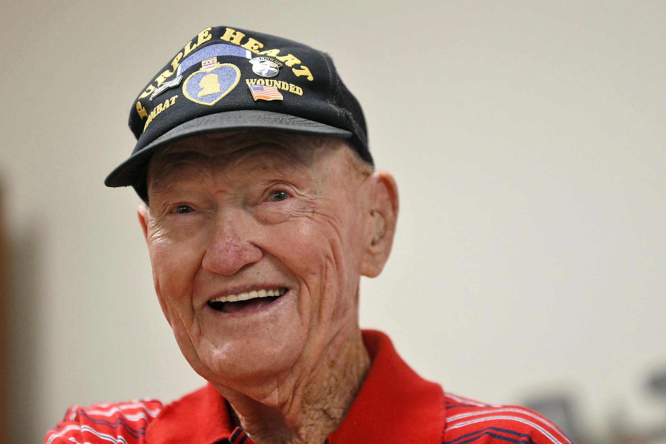 Robert White smiles after he was presented with a Bronze Star Tuesday afternoon at the Hampton VA Medical Center Aug. 21, 2018 in Hampton, Va. Private, First Class White of the 507th Parachute Infantry Regiment, 17th Airborne Division, received a Bronze Star for his actions during World War II. White participated in D-Day, the Battle of the Bulge and Operation Varsity.