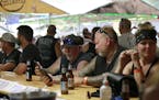 FILE - In this Aug. 7, 2020, file photo, people congregate at One-Eyed Jack's Saloon during the 80th annual Sturgis Motorcycle Rally in Sturgis, S.D. 