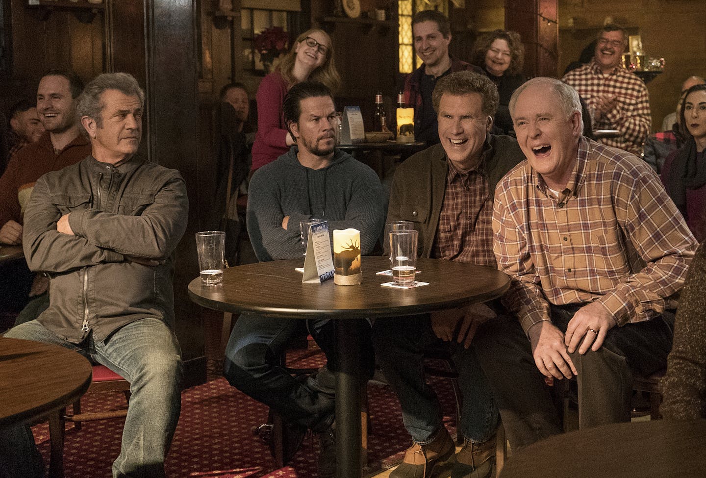 This image released by Paramount Pictures shows Mel Gibson, from left, Mark Wahlberg, Will Ferrell and John Lithgow in "Daddy's Home 2." (Claire Folger/Paramount Pictures via AP)