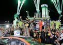 Martin Truex Jr. celebrates in Victory Lane after winning the NASCAR Cup Series auto race and season championship at Homestead-Miami Speedway in Homes
