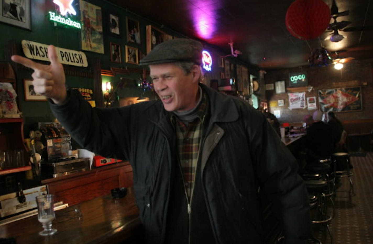 Spider John Koerner at Palmer's Bar in 2005, probably telling a story from the bar's storied past. / Star Tribune file photos