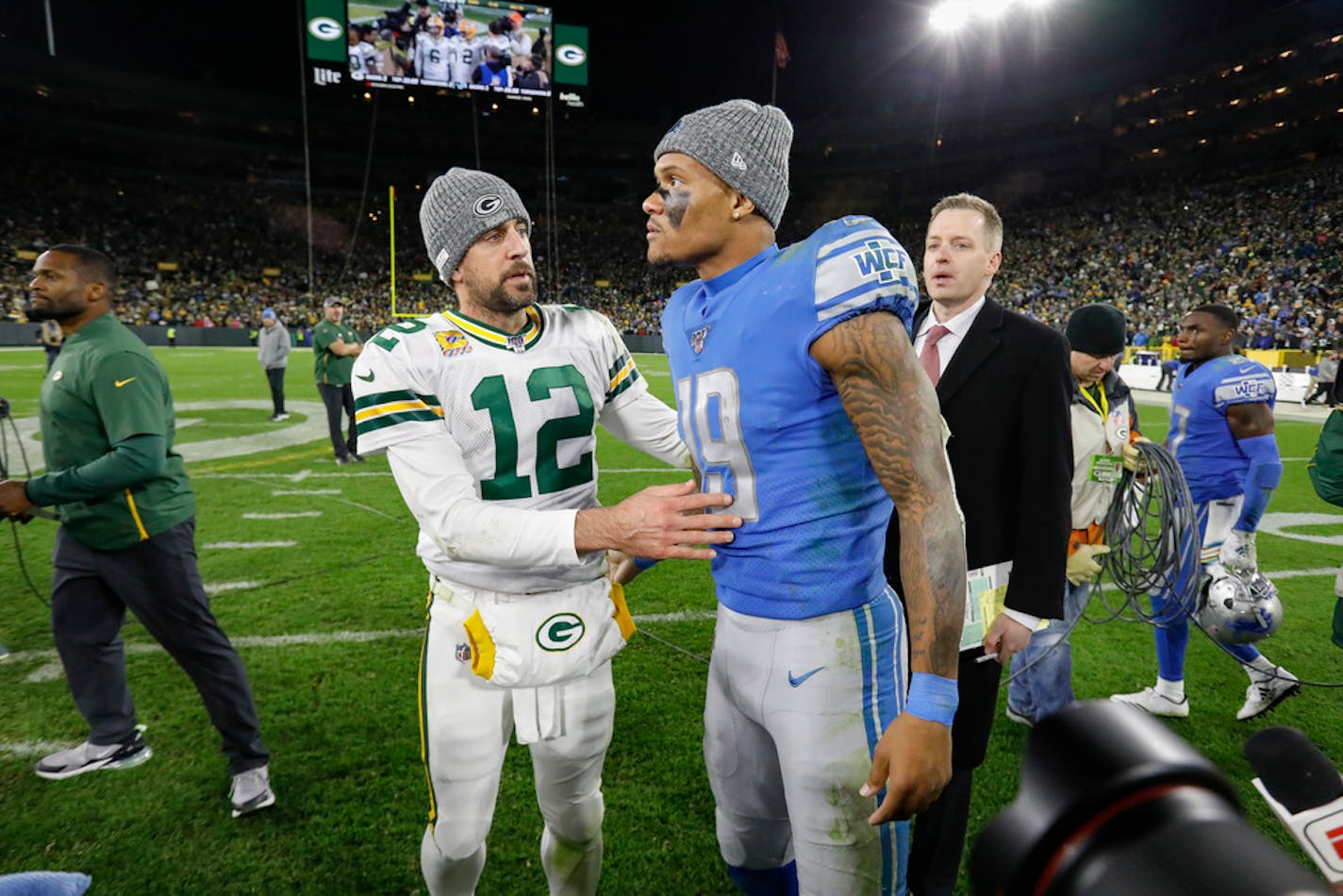 Green Bay Packers quarterback Aaron Rodgers and Detroit Lions wide receiver Kenny Golladay greet each other on the field following an NFL football game Monday, Oct. 14, 2019, in Green Bay, Wis. Green Bay won 23-22 (AP Photo/Mike Roemer)