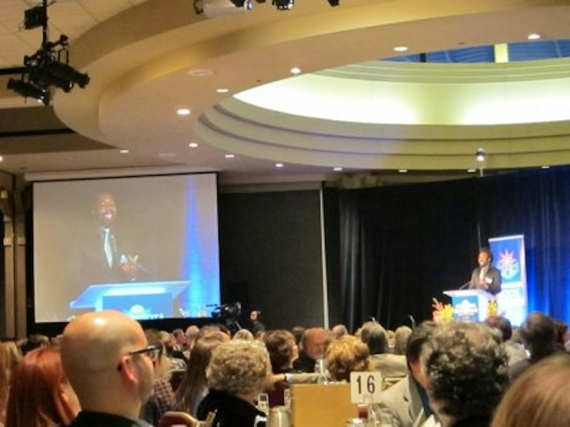 Last year's fiction winner, Marlon James, announced this year's fiction winner, John Reimringer, for his novel, "Vestments." Slightly blurry and crooked photos by Laurie Hertzel
