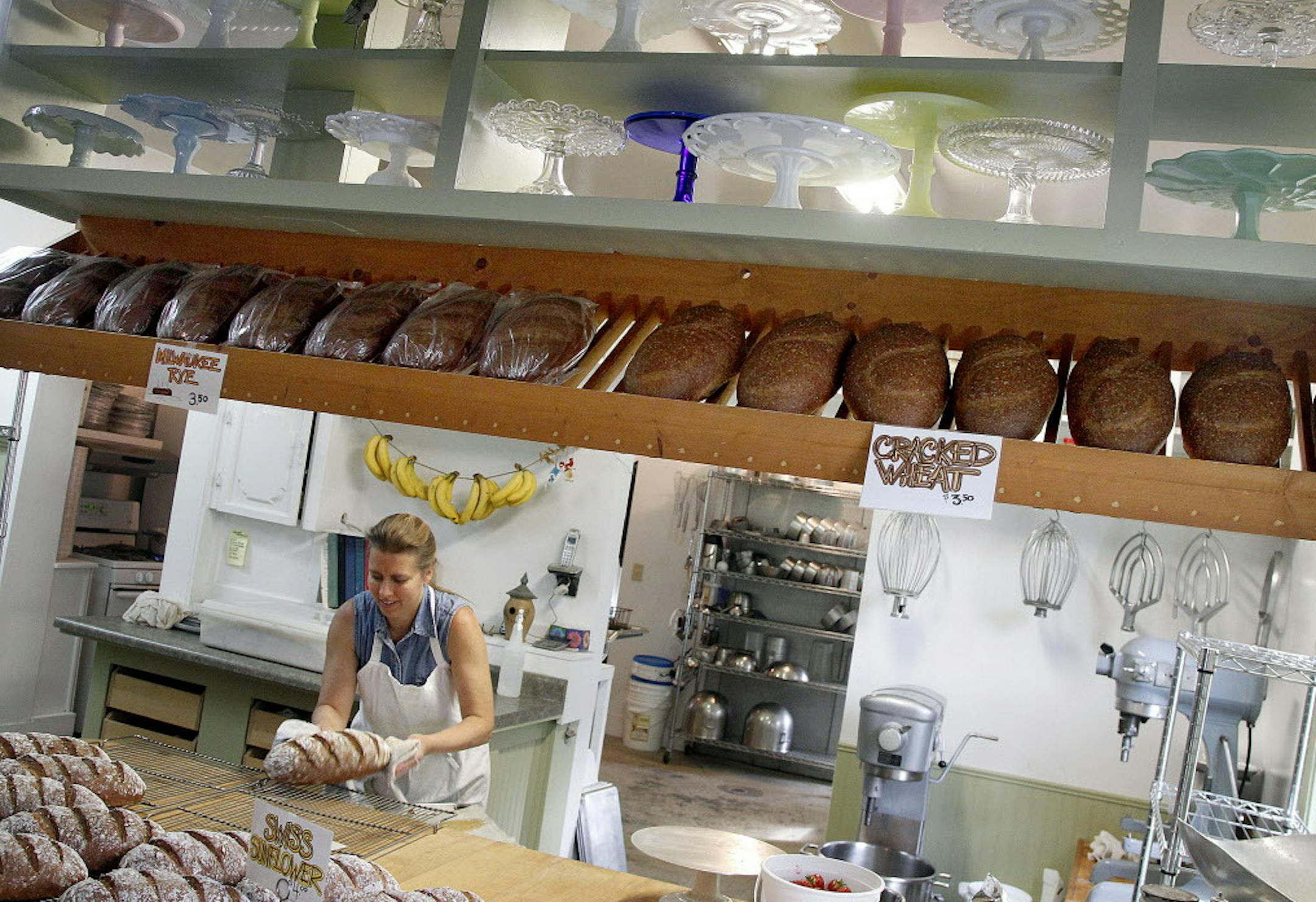 The Southeast of Minnesota is a taste extra by rick Nelson stopping at at least 25 places along his path. Maiden Rock‚Äôs Smiling Pelican Bakery, owned by, Sandra Theilman and David Meixner can sell out by noon on most weekends. TSandra takes bread out of the oven on a Saturday morning. Above her is her collection of cake stands. ] TOM WALLACE ‚Ä¢ twallace@startribune.com Assignments #20018615A_ June 27, 2011_ SLUG: rn0707_ EXTRA INFORMATION:
