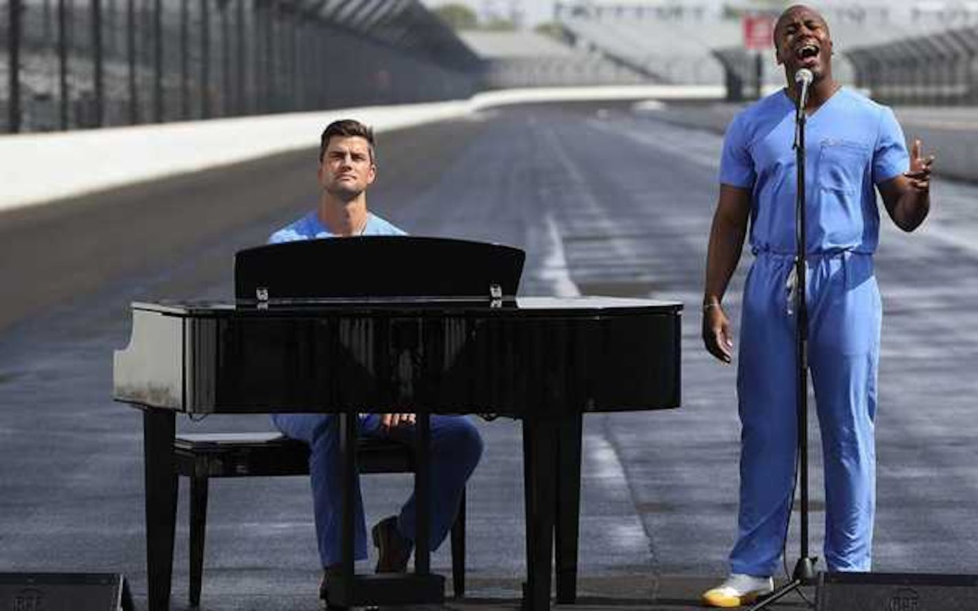 Dr. William Robinson, left, and Dr. Elvis Francois performed "God Bless America" at the Indianapolis Motor Speedway.