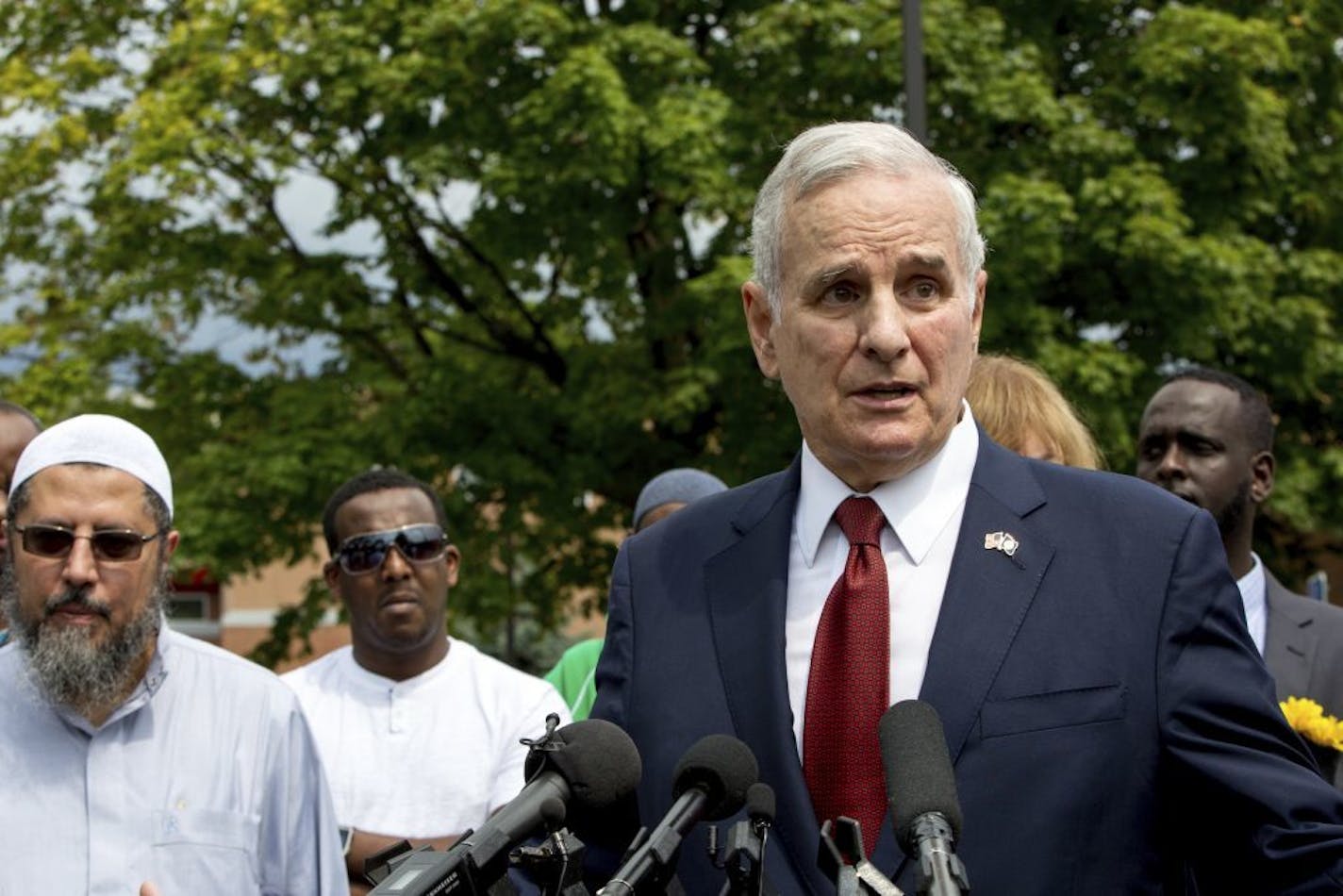 Minnesota Gov. Mark Dayton speaks at a news conference at the Dar Al Farooq Islamic Center in Bloomington, Minn., on Sunday, Aug. 6, 2017, where an explosion damaged a room and shattered windows as worshippers prepared for morning prayers early Saturday.