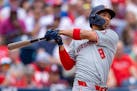Nationals outfielder Eddie Rosario hits a home run during Sunday's game against the Phillies in Philadelphia.