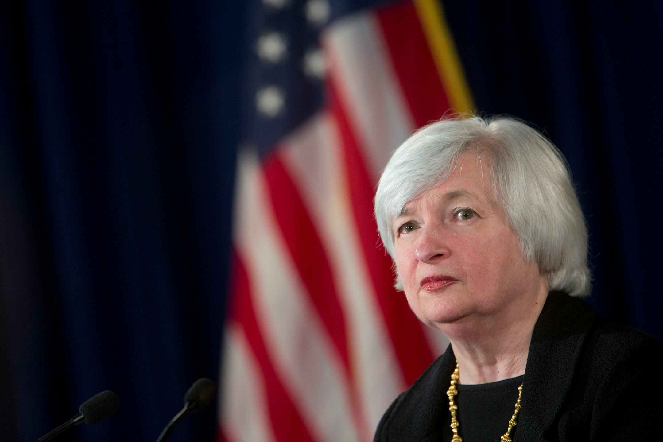 Janet Yellen, chair of the U.S. Federal Reserve, listens to a question during a news conference following a Federal Open Market Committee (FOMC) meeting in Washington, D.C., U.S., on Wednesday, Sept. 17, 2014. The Federal Reserve maintained a commitment to keep interest rates near zero for a "considerable time" after asset purchases are completed, saying the economy is expanding at a moderate pace and inflation is below its goal. Photographer: Andrew Harrer/Bloomberg *** Local Caption *** Janet
