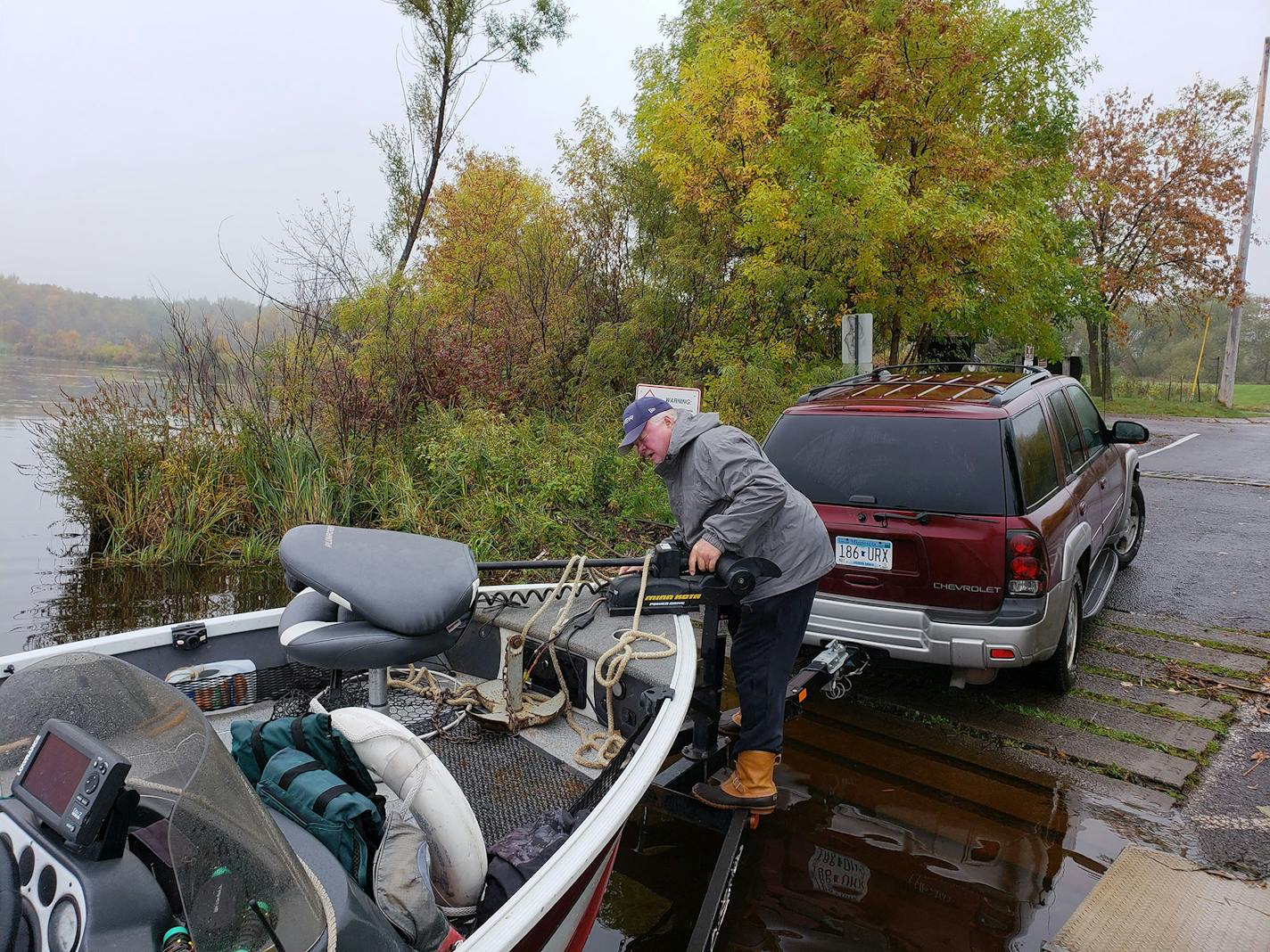 Bob Maas, 73, prepared to fish the St. Louis River. He gets out almost every day on the river.